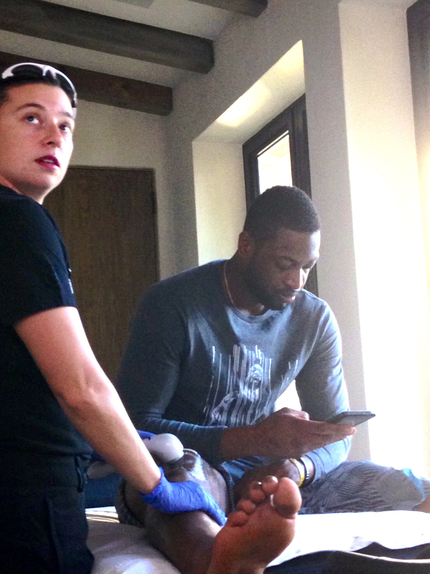 Joan Rubinger treating Dwyane Wade