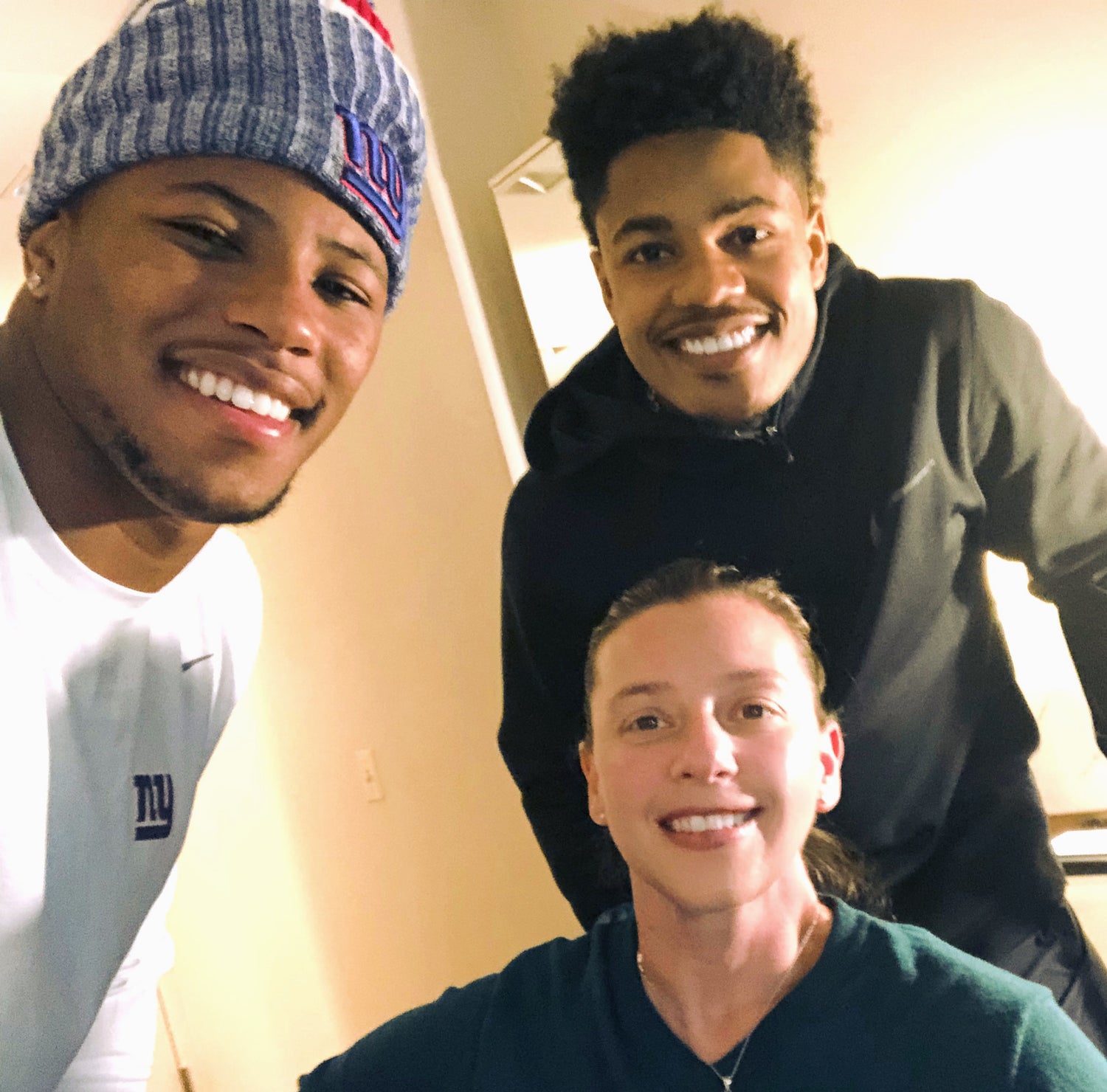 Joan Rubinger with Saquon Barkley and Sterling Shepard