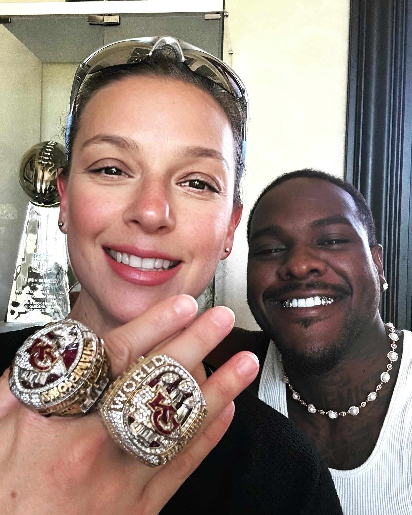 Joan Rubinger with Frank Clark Super Bowl Rings